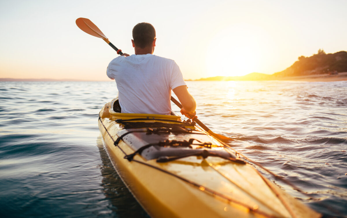 Happy Renter Enjoying Outdoor Hobbies Like Kayaking Near New Home – Lifestyle Matching with PorchLight